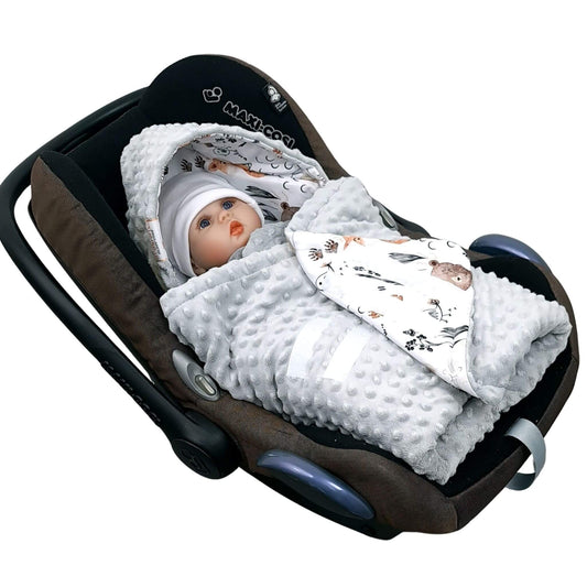 Close-up of Evcushy Forest Animal Friends car seat blanket with secure Velcro fastening for easy wrapping