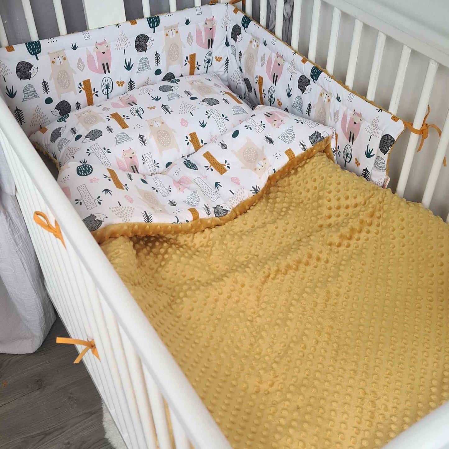 cot bed bedding with filling and bumper mustard colour and forest animals pattern cotton and minky plush