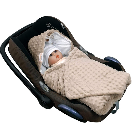 Baby wrapped in Evcushy Retro Bunny Blanket with taupe minky plush in car seat for infants