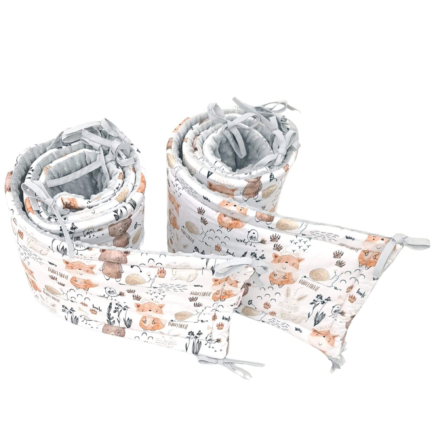 Close-up of woodland animals and forest pattern cotton bumper set for cot bed all around