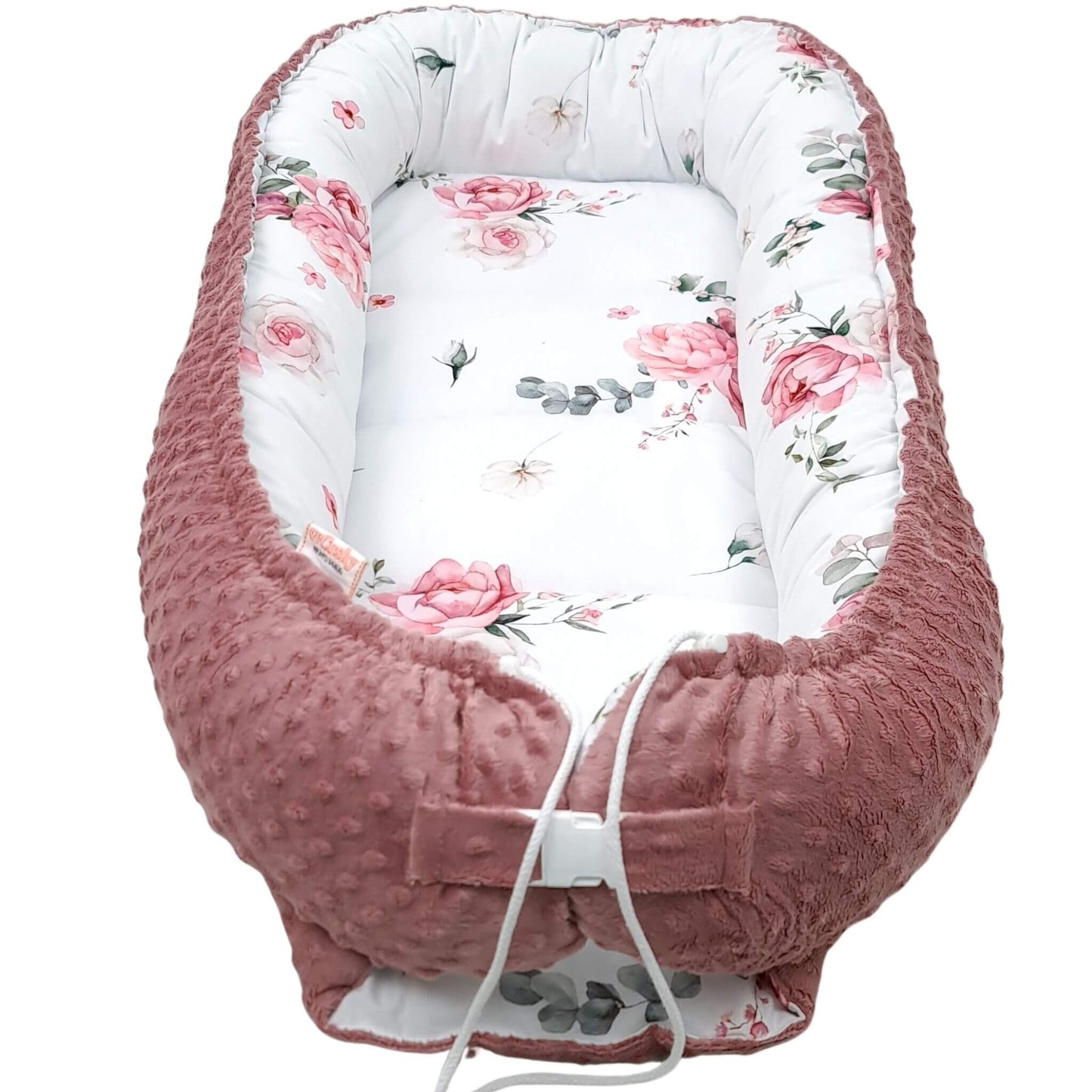 Side view showing adjustable buckle and drawstrings on Blooming Rose baby nest XXL