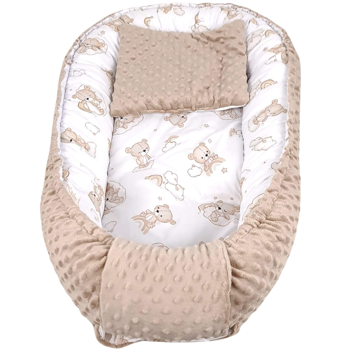 A baby bassinet or bassinet set with a padded cream and beige teddy bear print lining, a solid beige textured minky pillow, and a matching beige textured bassinet cover, shown on a plain white background.