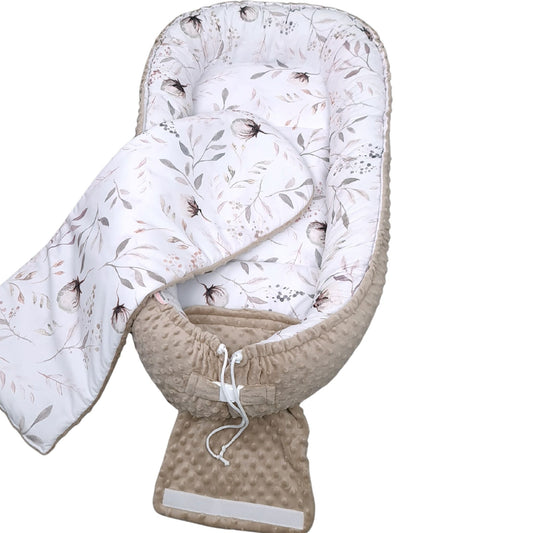 Close-up of delicate cotton flower fabric on Cotton Blossom baby pod