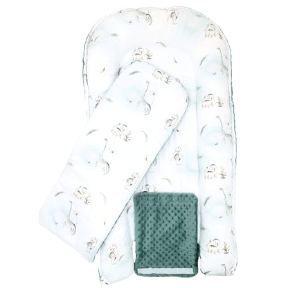 Top view of Dino Adventure XXL baby nest with liner with olive green plush bottom and dinosaur cotton pattern