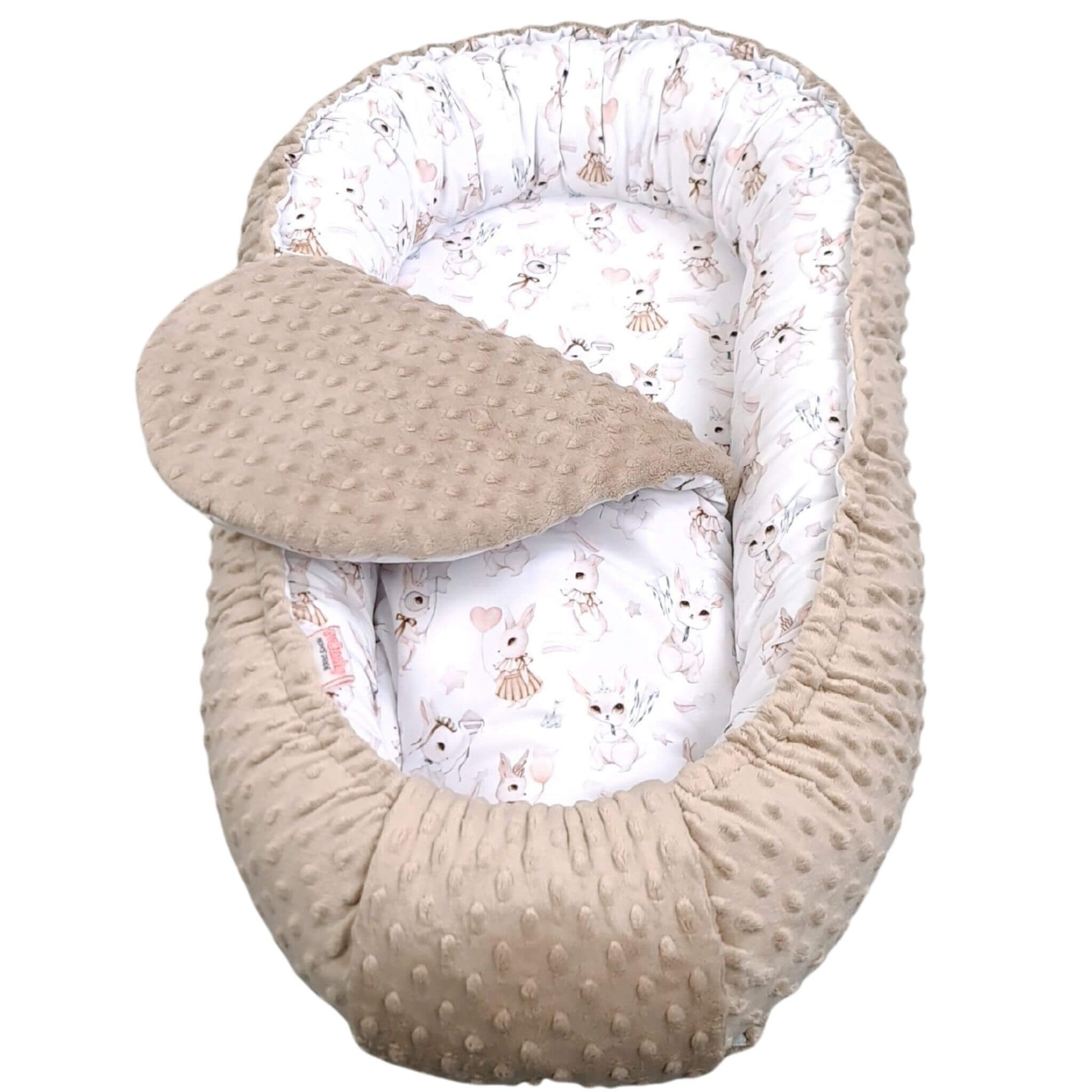 Baby nest with bunnies patterned interior and textured exterior in plush neutral taupe colour