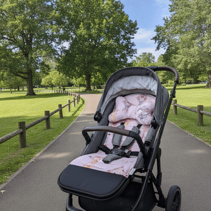 Evcushy Ballerina reversible stroller liner with matching head support pillow fitted inside a buggy. Soft padded cotton and velvet pram liner with washable footrest.