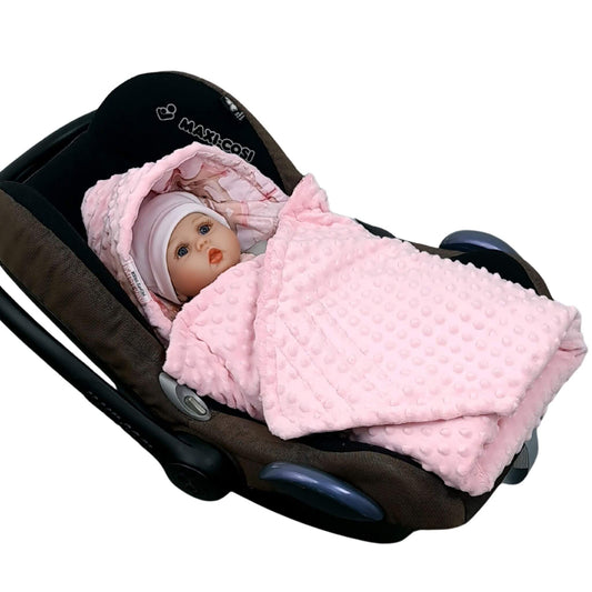 Baby girl wrapped in Evcushy Ballet Dreams Blanket with pink minky plush in car seat