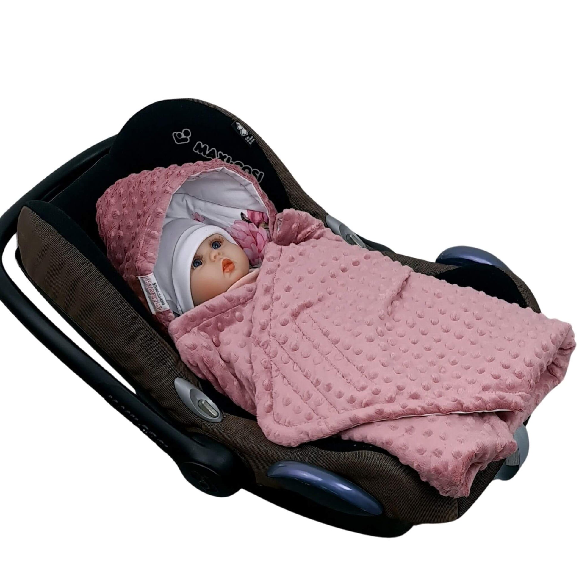 Baby wrapped in Evcushy Blooming Rose Blanket in car seat – soft Foxglove pink minky