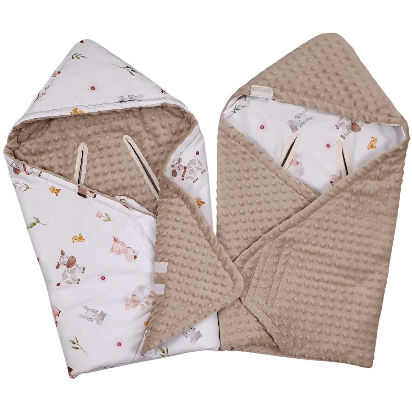 Two baby swaddle blankets with a textured beige minky dot fabric and a white hooded insert printed with small farm horses, cows, sheep, bunnies illustrations, shown on a plain white background.
