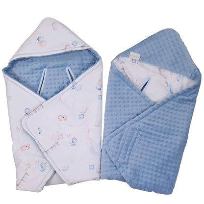 Two baby swaddle blankets shown on a plain white background. One is white with a light blue dotted minky texture and small pastel cloud and bird prints, and the other is folded to show the light blue dotted minky fabric. they fit 3 and 5 points harness system