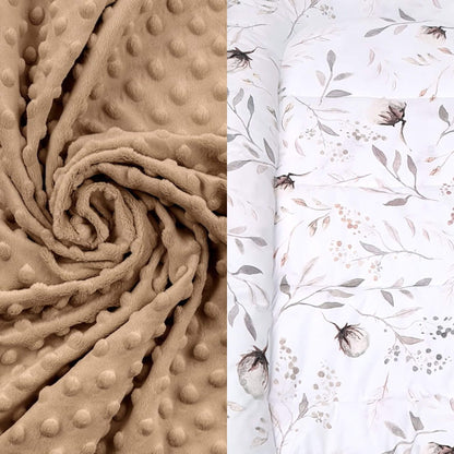 Textured beige fabric and floral-patterned fabric neutral style quilt and pillow for toddler