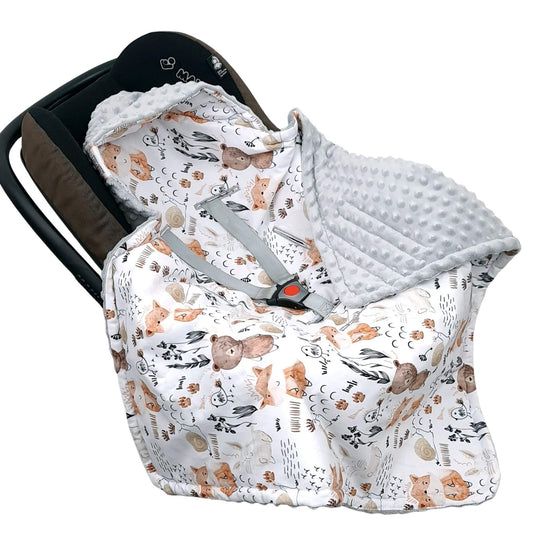 Evcushy Forest Animal Friends baby car seat blanket fitted in a 3-point harness for newborn safety and comfort
