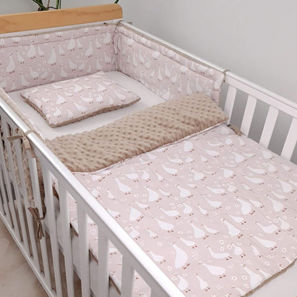 Evcushy Geese Family baby bedding set in a cot featuring soft cotton fabric and plush minky, including quilt and pillow for newborn babies.