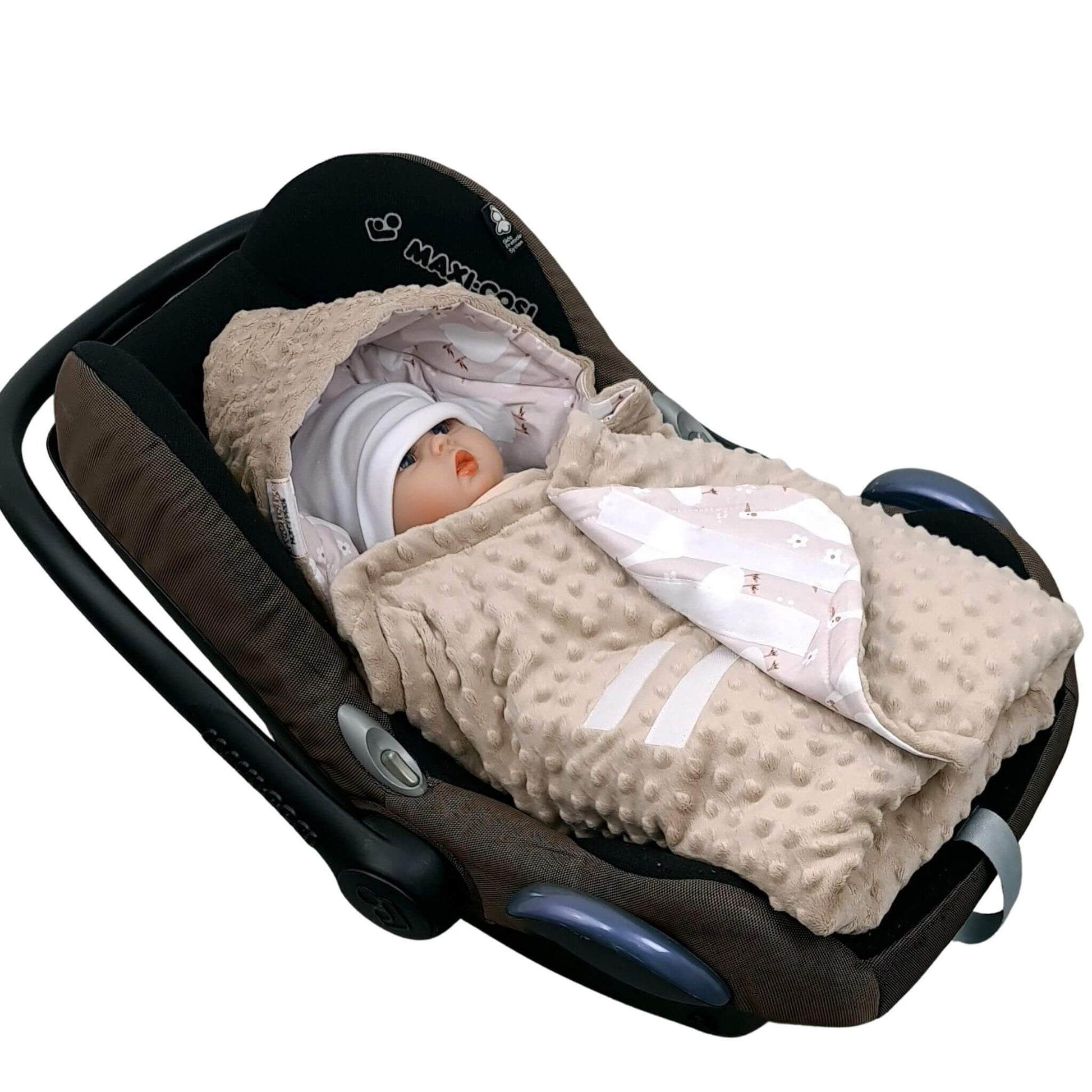Evcushy Geese Family Blanket fitted in infant car seat with 3-point harness, visible velcro closing
