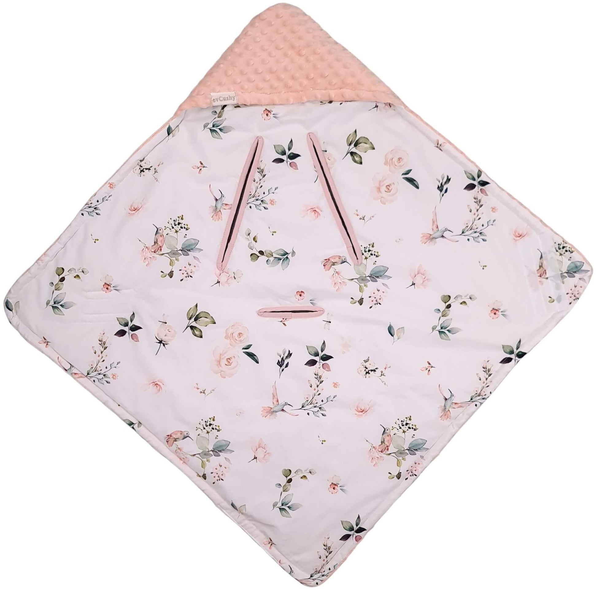 A baby hooded blanket with a light pink and white floral print on one side and a textured peach-pink plush hood on the other, shown on a plain white background.