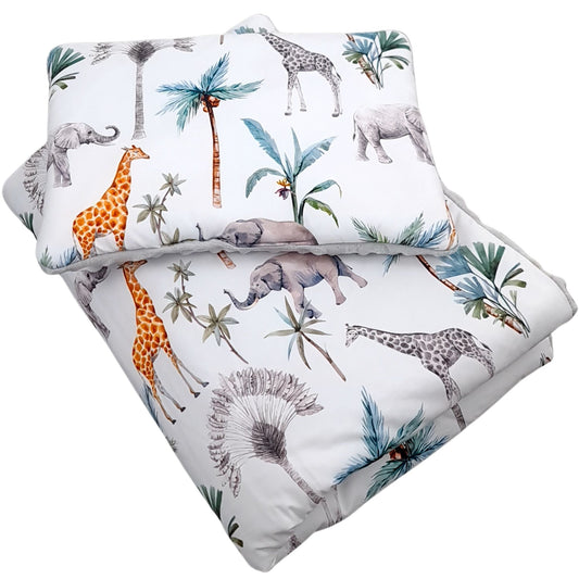 Jungle-themed comforter set with elephants, giraffes, and palm trees on a white background