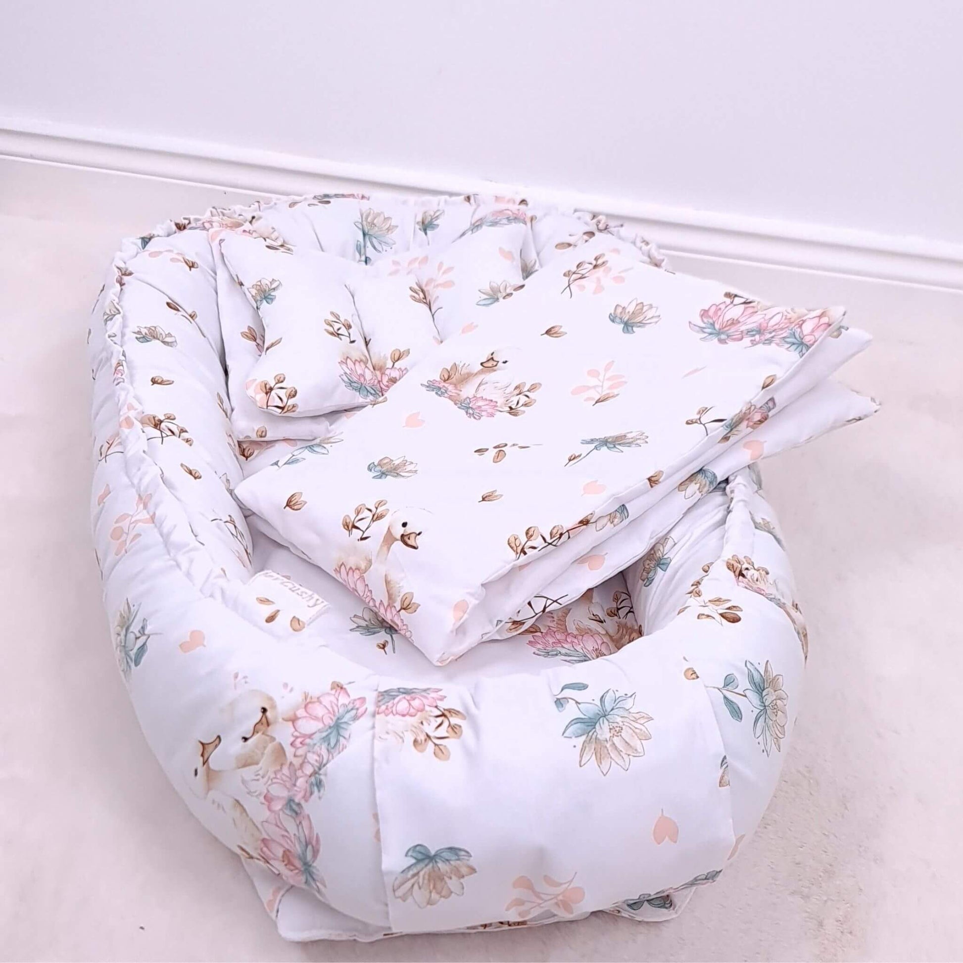 Floral baby nest bedding set with quilt and pillow in elegant swan and lotus flower print for babies 0–9 months