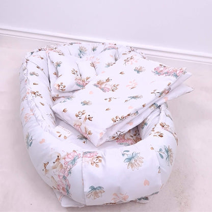 Floral baby nest bedding set with quilt and pillow in elegant swan and lotus flower print for babies 0–9 months