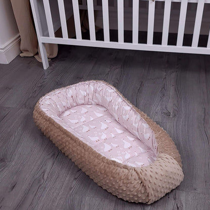 Evcushy Geese Family baby nest styled in modern nursery, newborn baby pod in pink and taupe tones