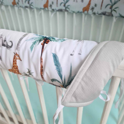 safari dream nursery with giraffes and elephants cot bed rail bumper grey and white with animals and palmswith