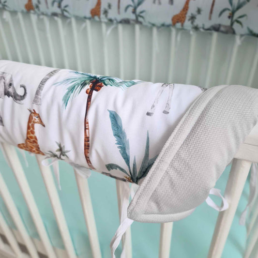 safari dream nursery with giraffes and elephants cot bed rail bumper grey and white with animals and palmswith