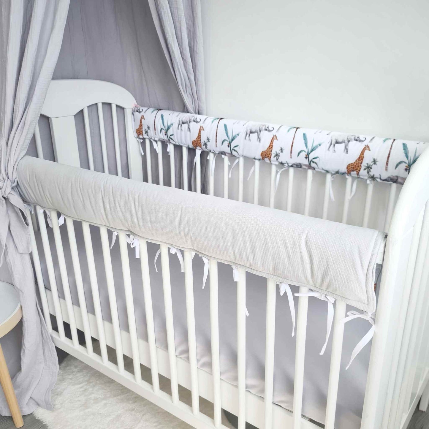 baby cot bed protector for rail while baby bites the rail