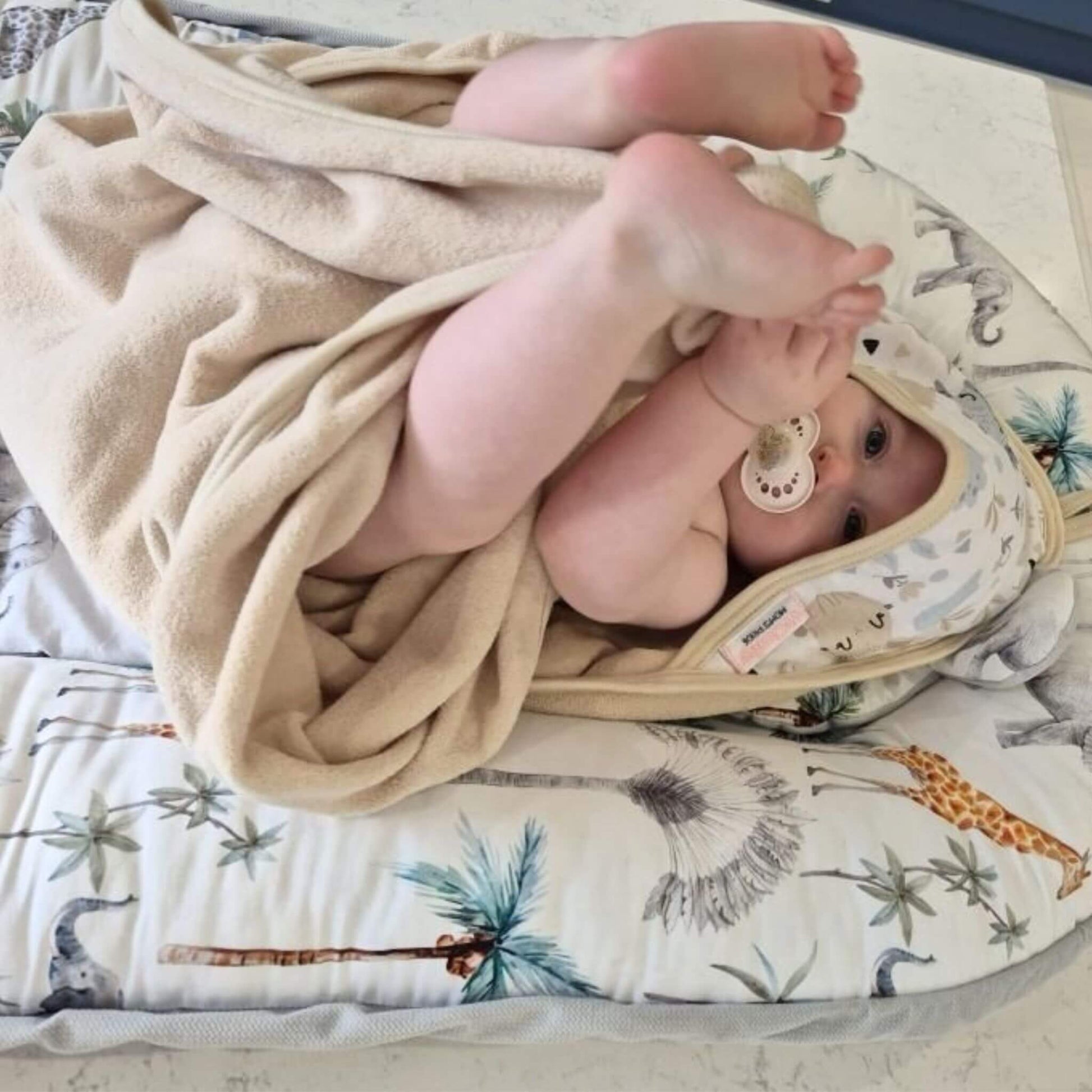baby in a cosy warm cotton towel  with hood that suits r children from 0-4 years big size towel 